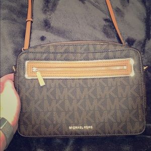 Michael Kors jet set travel crossbody bag.
